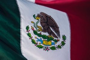 Renting vs buying property in Mexico - Mexican Flag